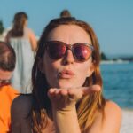 woman flying kiss