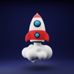 a red and white toy rocket on a blue background
