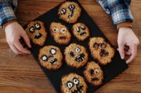 Homemade Halloween cookies shaped like monsters, perfect for a spooky treat.