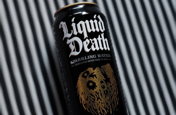 a can of liquid sitting on top of a table